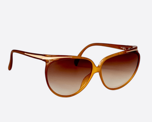 Side view of Viennaline 1195 sunglasses from the 1970s with light brown cat-eye frames and new brown gradient lenses, made in Germany.