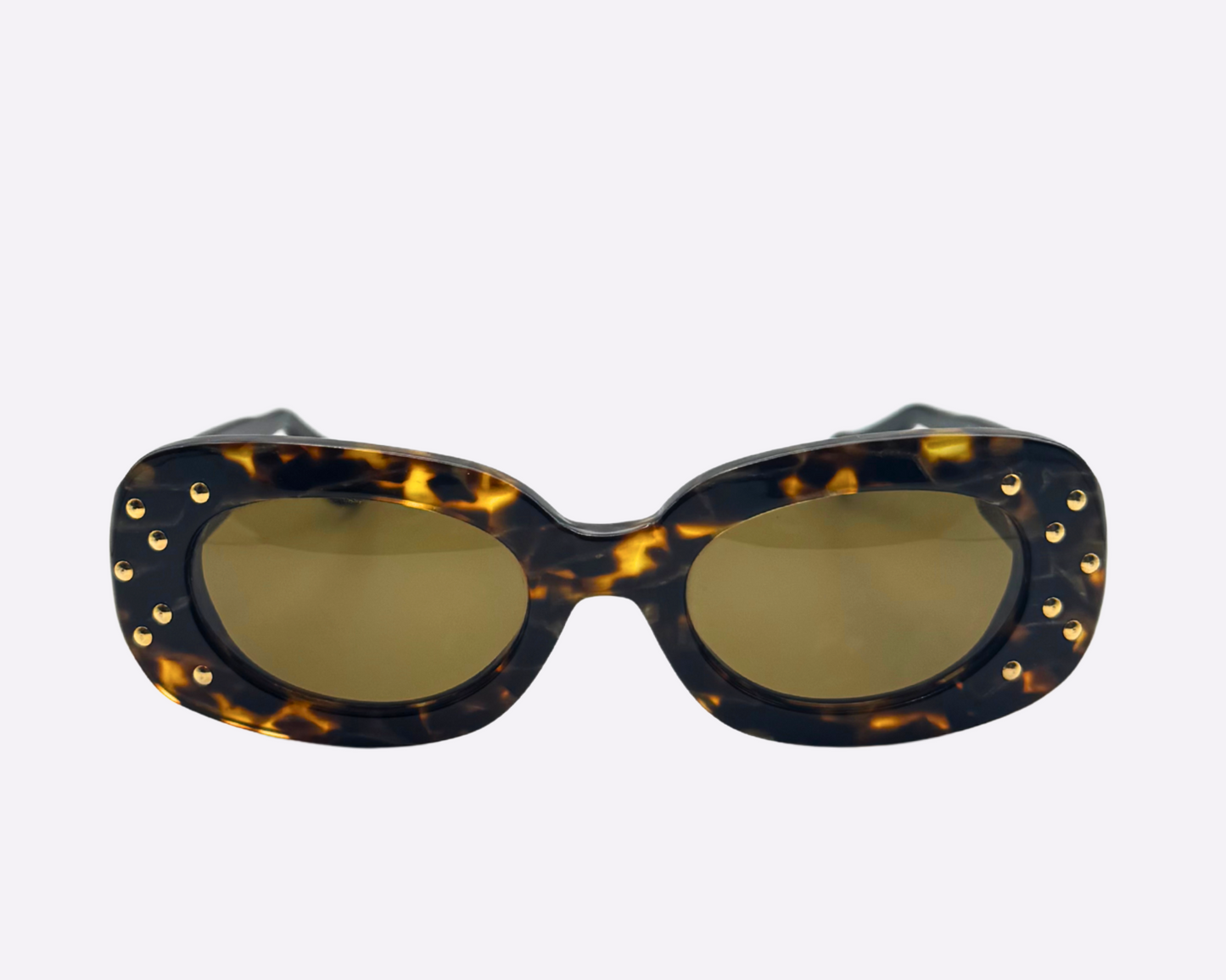 Front view of vintage Concert sunglasses with brown tortoise frames, featuring dazzling gold strass details on the front of the frame, shown on a light gray background.