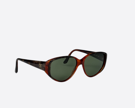 Side view of Valentino V148 322 sunglasses, showcasing the green snake pattern on the temples and the speckled red and brown cat-eye frame from the 1990s.