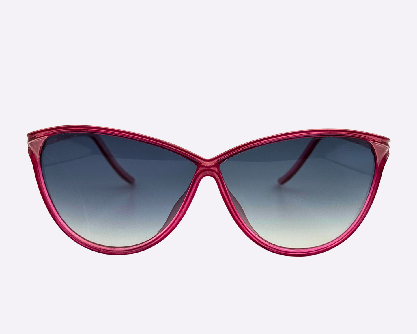 Front view of Christian Latour sunglasses with a pink frame and new gradient grey lenses.