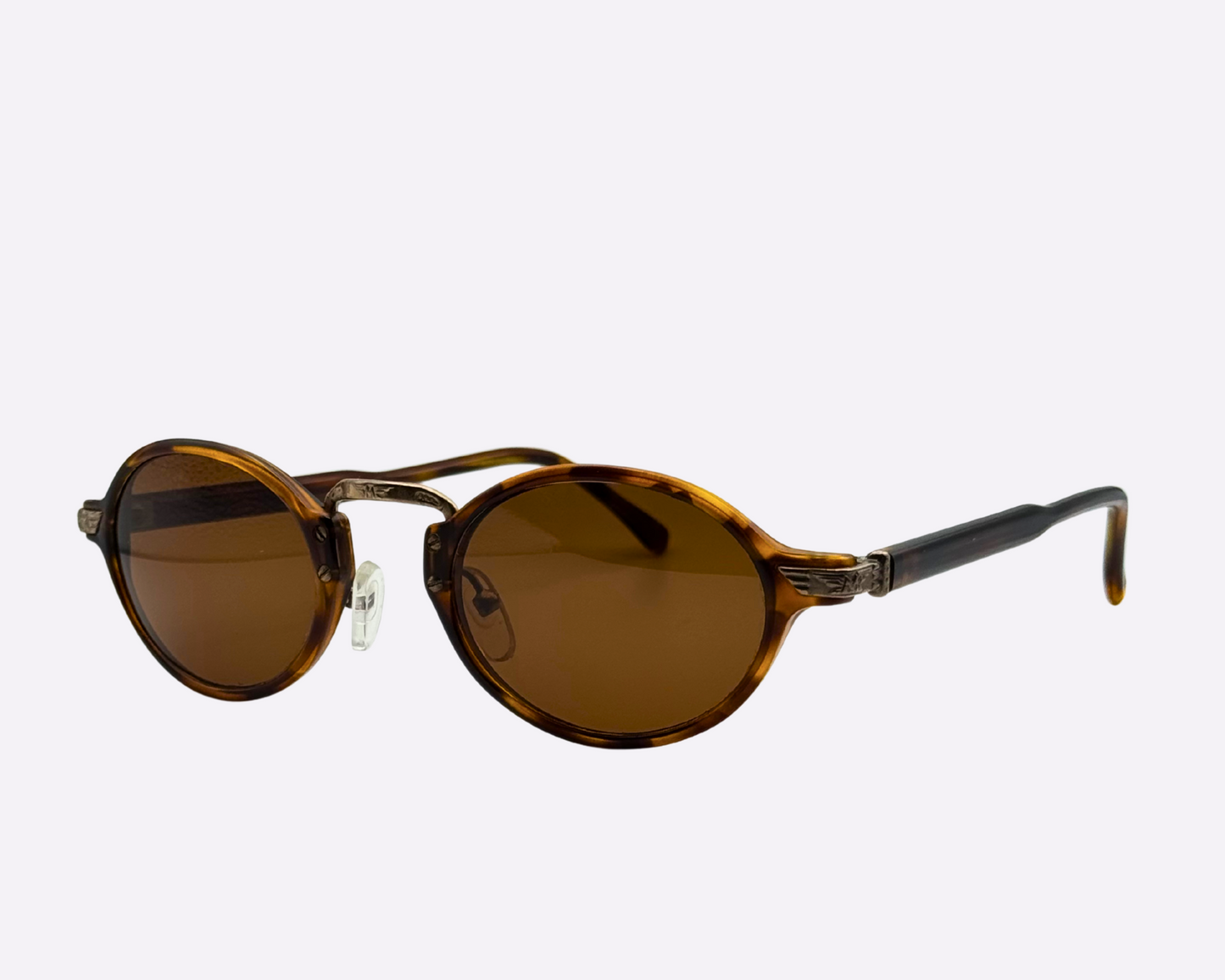 Brown sunglasses with tortoiseshell frame on a white background