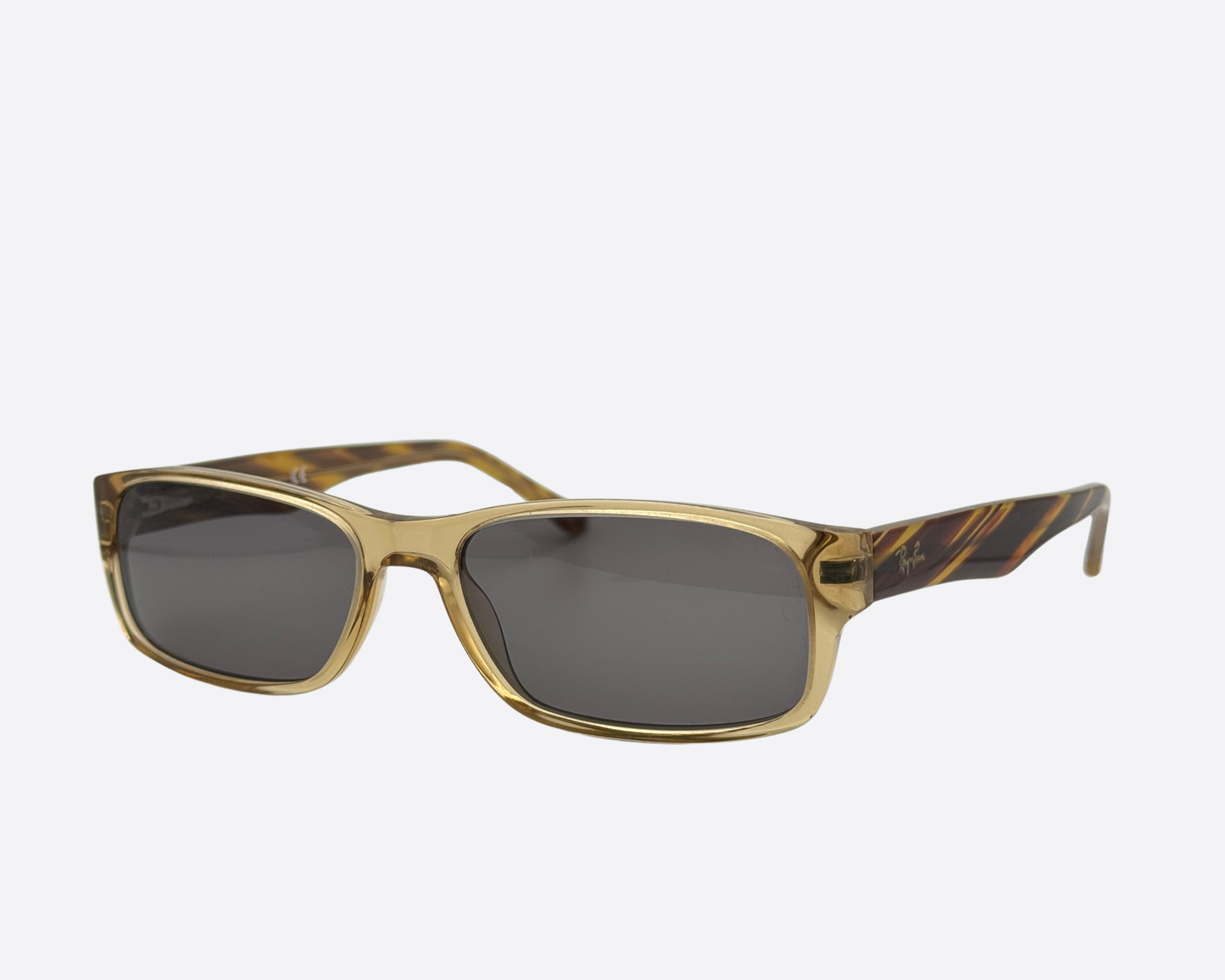 Classic Ray-Ban rectangular shades with transparent frames and retro striped arms.