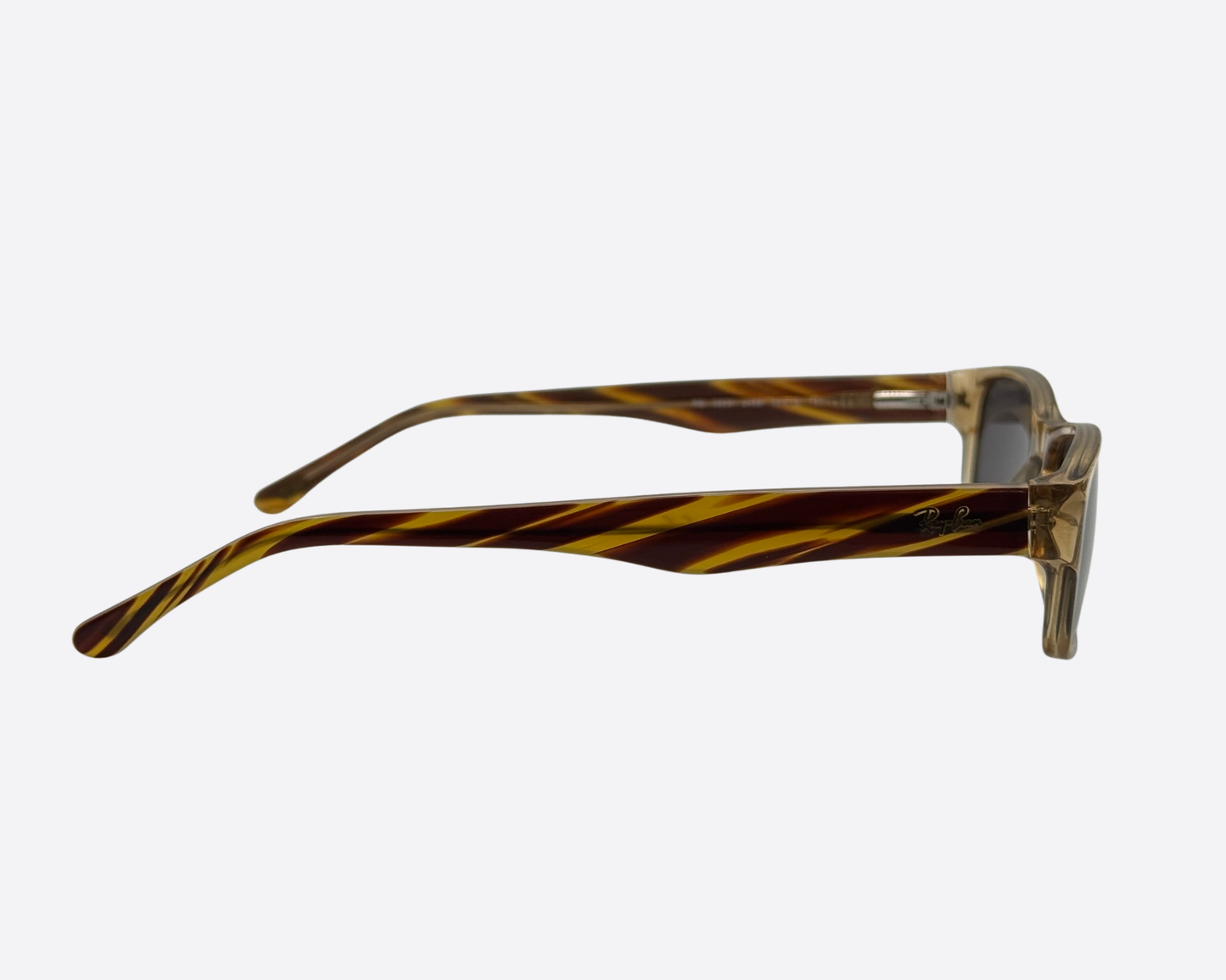 Side view of Ray-Ban sunglasses showing the unique brown and yellow striped tortoiseshell pattern.