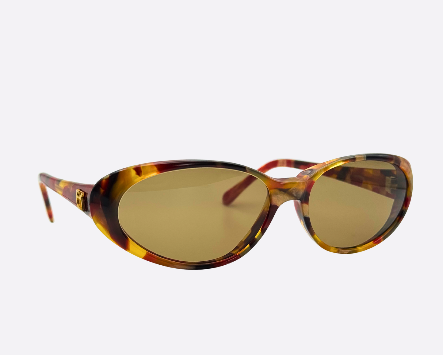 Angled view of Emmanuelle Khanh model 2018-12 eyewear, showcasing the subtly upswept oval silhouette and the high-gloss finish of the French-made designer frames.