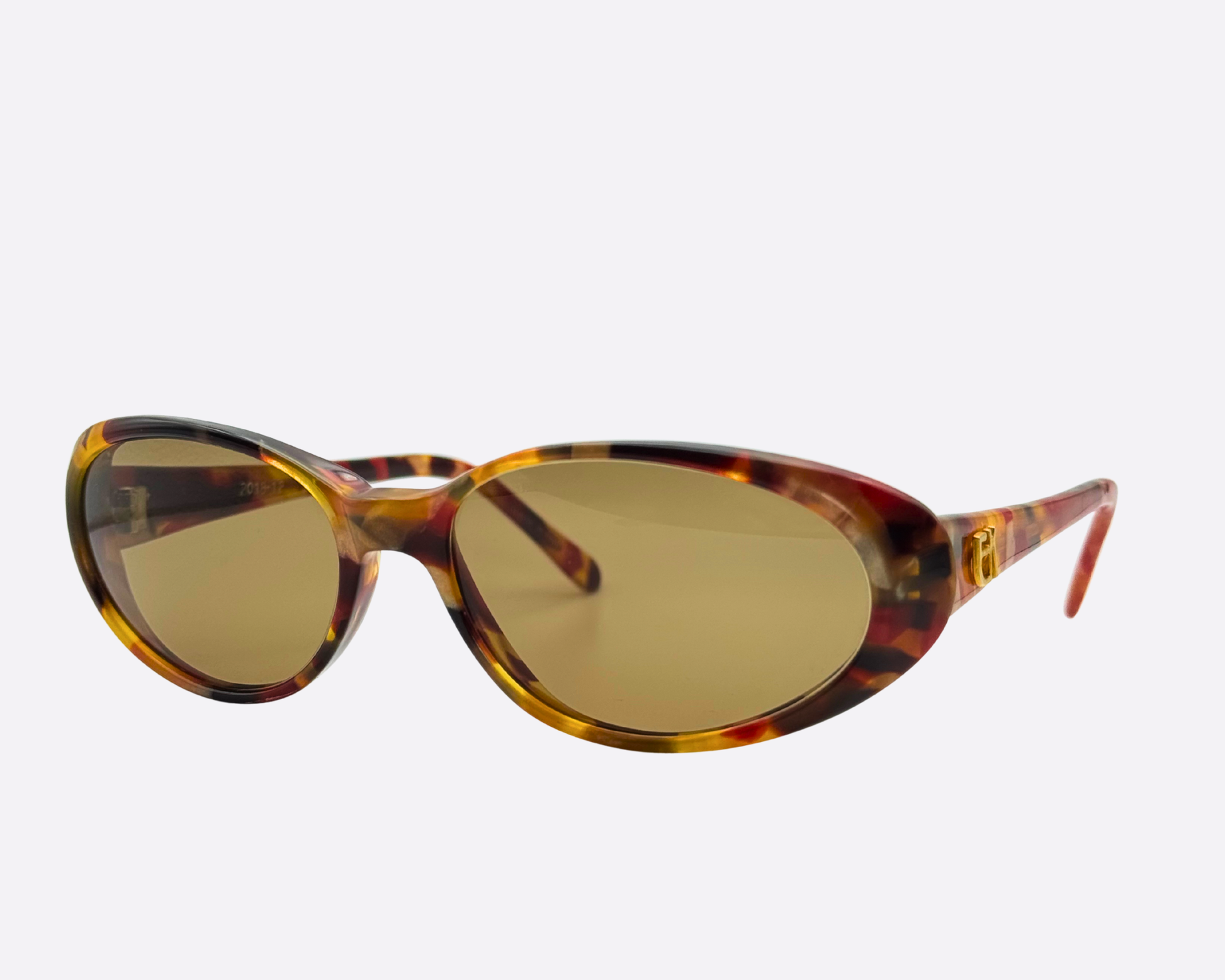 Angled view of Emmanuelle Khanh model 2018-12 eyewear, showcasing the subtly upswept oval silhouette and the high-gloss finish of the French-made designer frames.