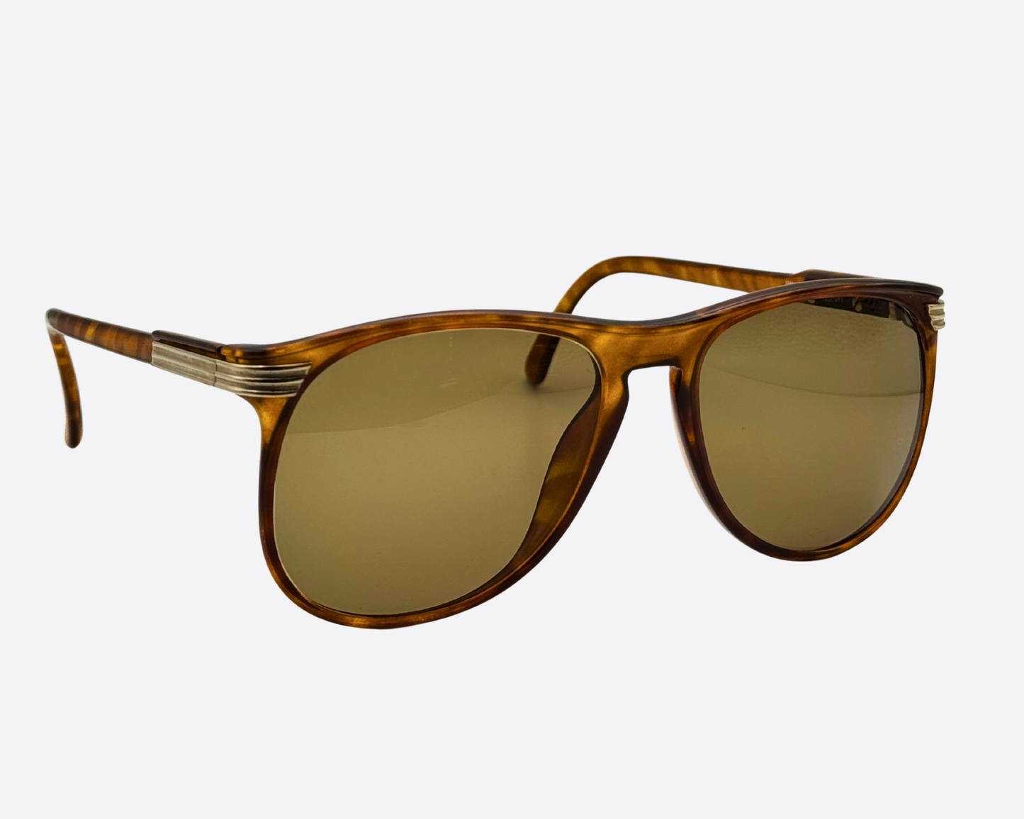 Side view of unworn Viennaline 1200 sunglasses, showing the polished tortoiseshell temples and sturdy 80s construction, New Old Stock (NOS) luxury eyewear made in Austria.