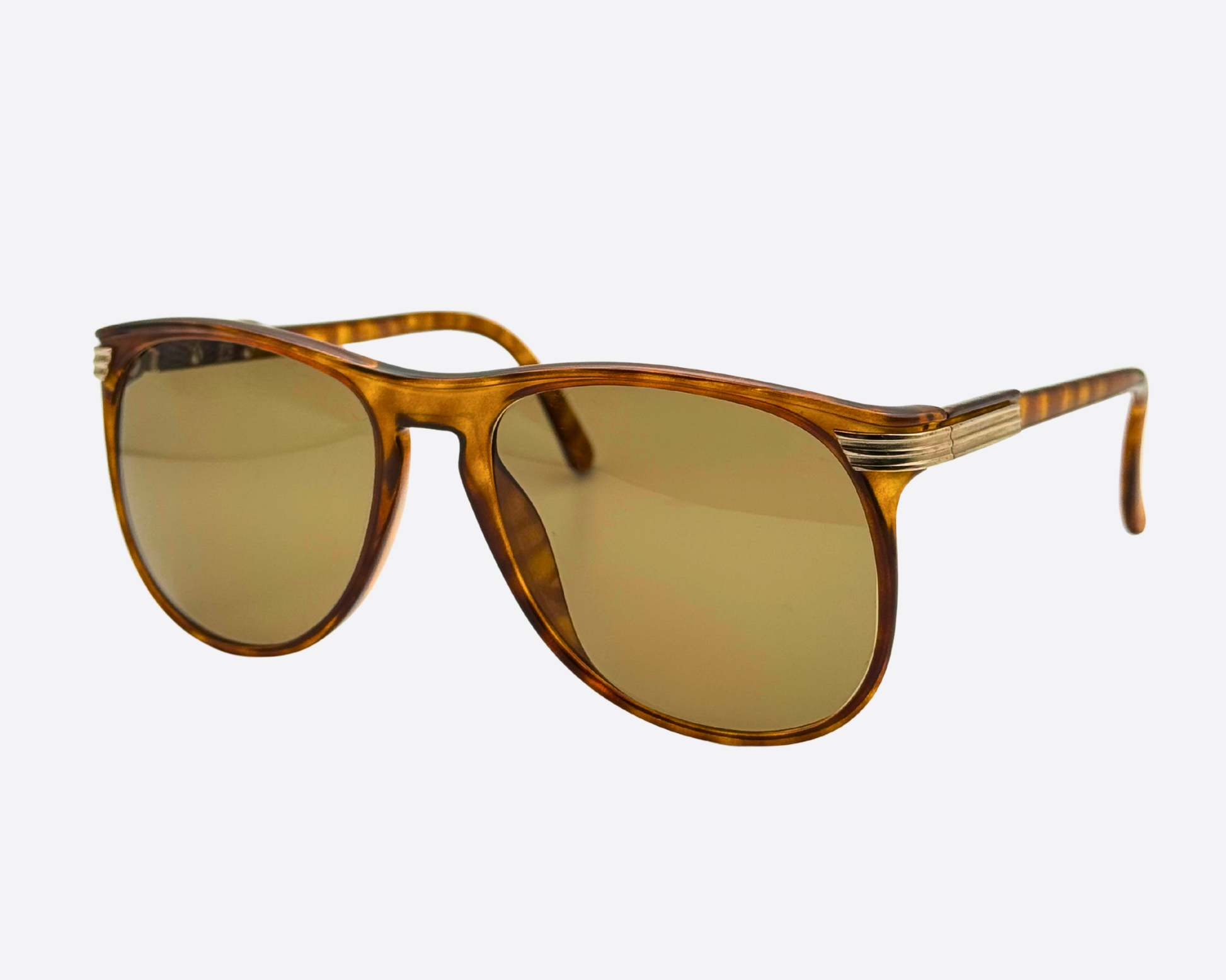 Side view of unworn Viennaline 1200 sunglasses, showing the polished tortoiseshell temples and sturdy 80s construction, New Old Stock (NOS) luxury eyewear made in Austria.