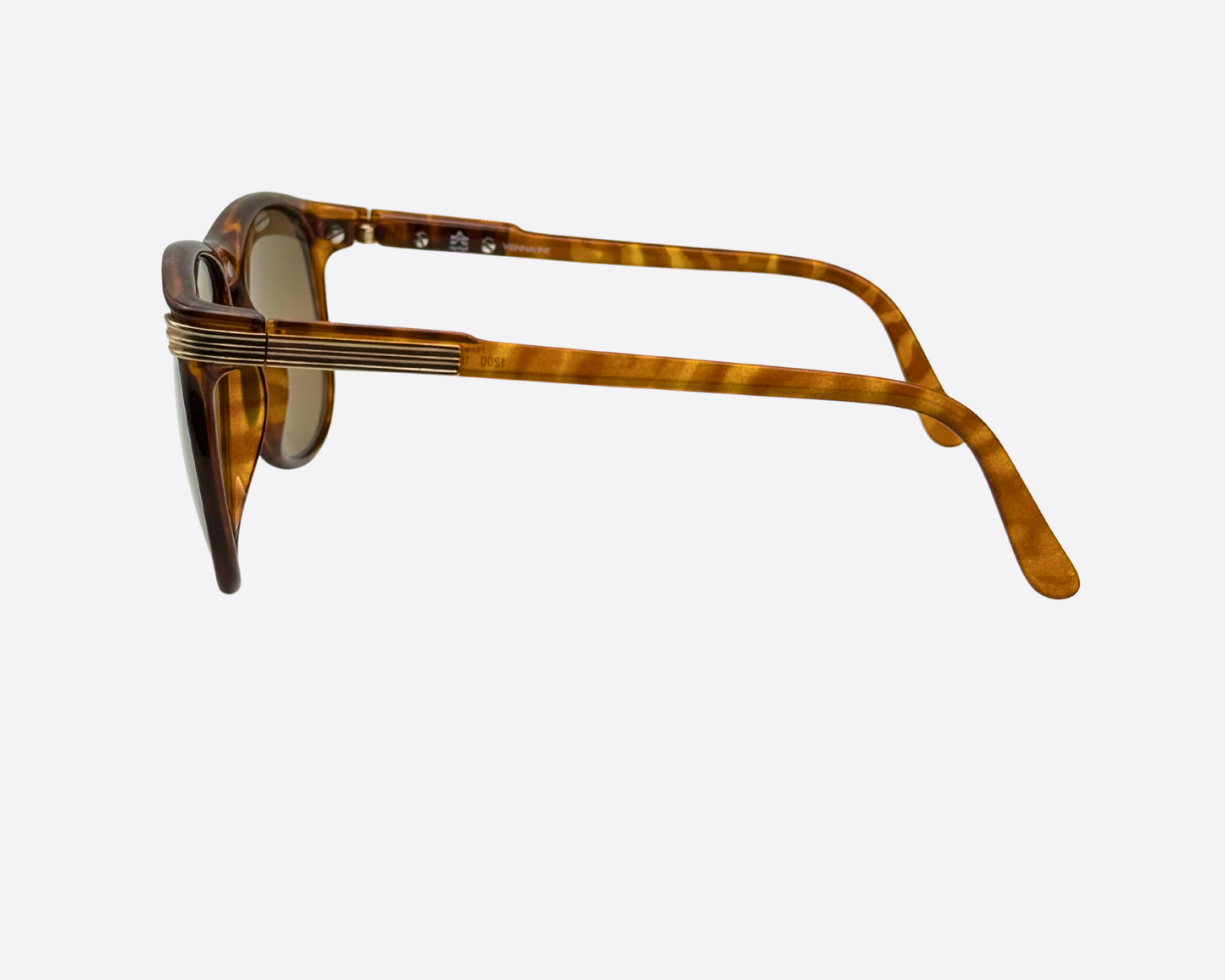 Side view of unworn Viennaline 1200 sunglasses, showing the polished tortoiseshell temples and sturdy 80s construction, New Old Stock (NOS) luxury eyewear made in Austria.