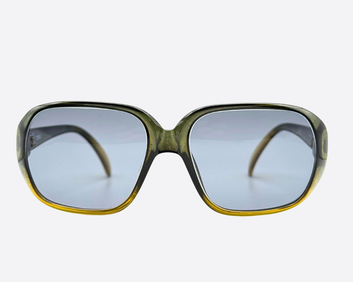 Symmetrical front view of Cobra 3036 sunglasses with new professional grey UV protection lenses, highlighting the artistic olive-to-yellow acetate frames.