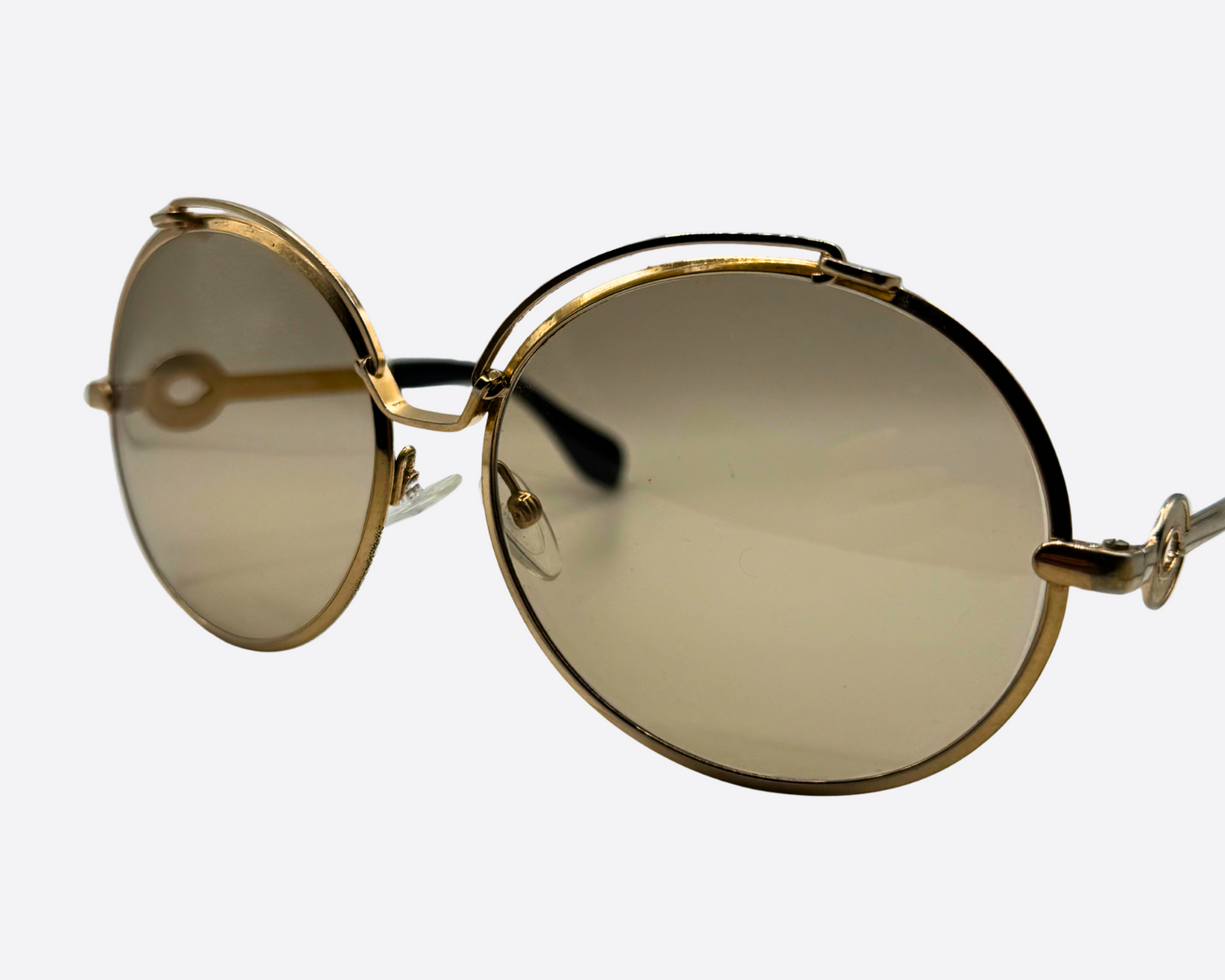 Silhouette – Oversized Gold Metal | 70s Vintage