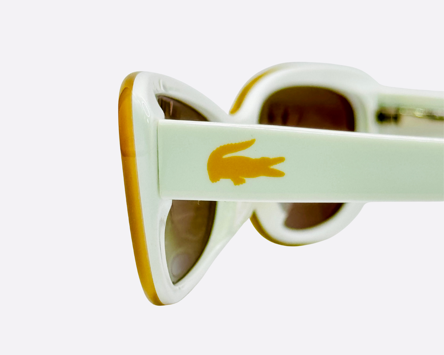 Lacoste L2611 – Off-White & Yellow Oval | Y2K Vintage