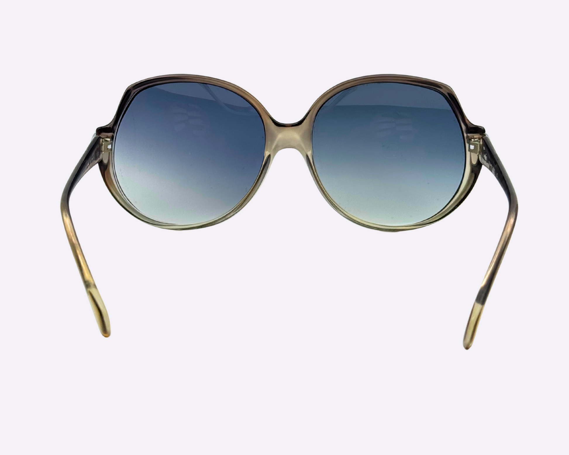 Rear view of vintage Indo sunglasses with oversized frame and new blue-grey gradient lenses
