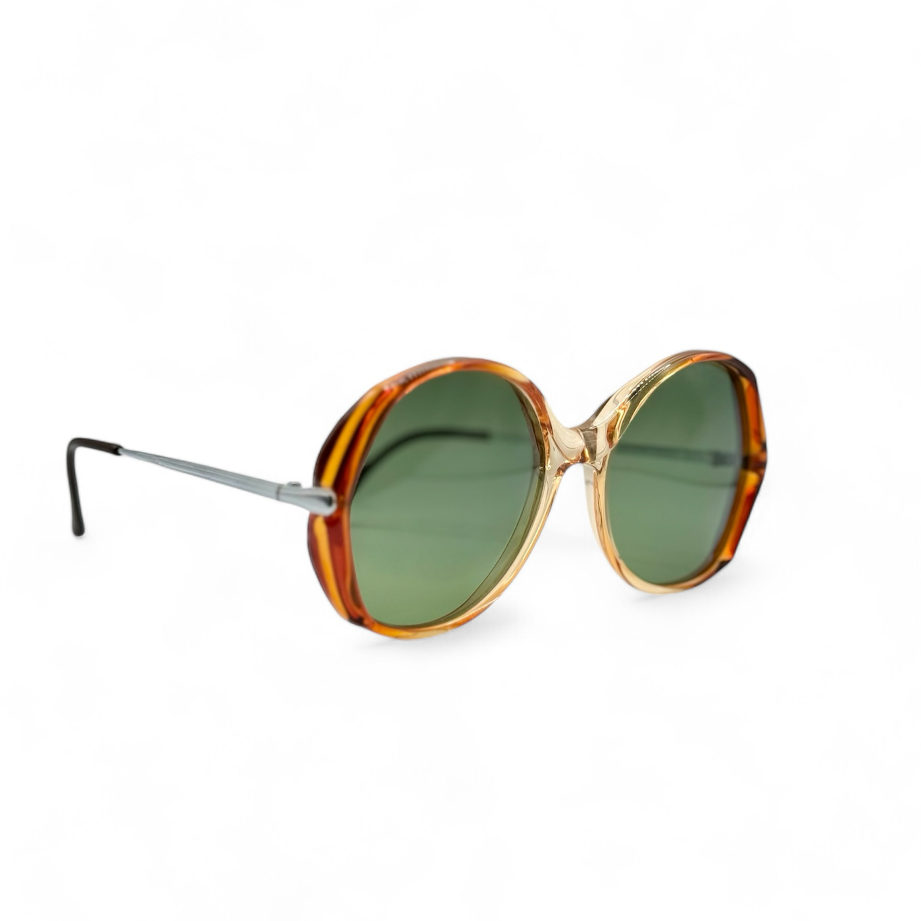 Side view of retro sunglasses featuring brand new UV-protective green lenses and round bronze frames by IDOS, made in Italy, highlighting the sleek metal detailing along the sides