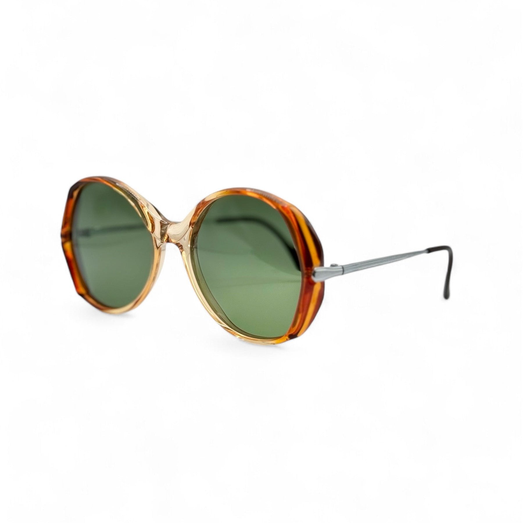 Side view of retro sunglasses featuring brand new UV-protective green lenses and round bronze frames by IDOS, made in Italy, highlighting the sleek metal detailing along the sides