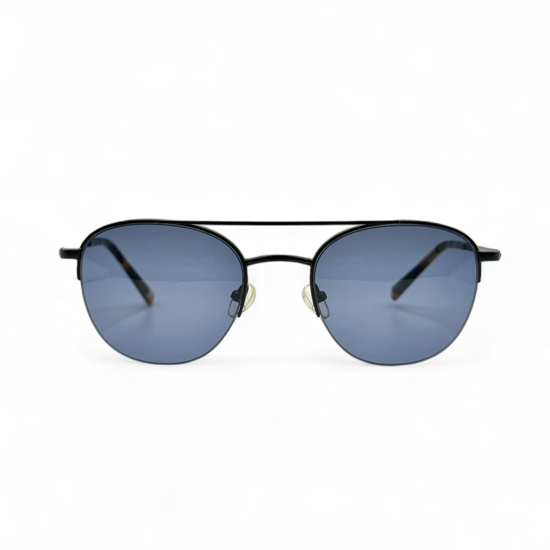 Front view of Société des Lunetiers sunglasses, showcasing fine French craftsmanship with black frames and dark blue lenses. Updated with new UV400 lenses, combining stylish design and excellent sun protection.