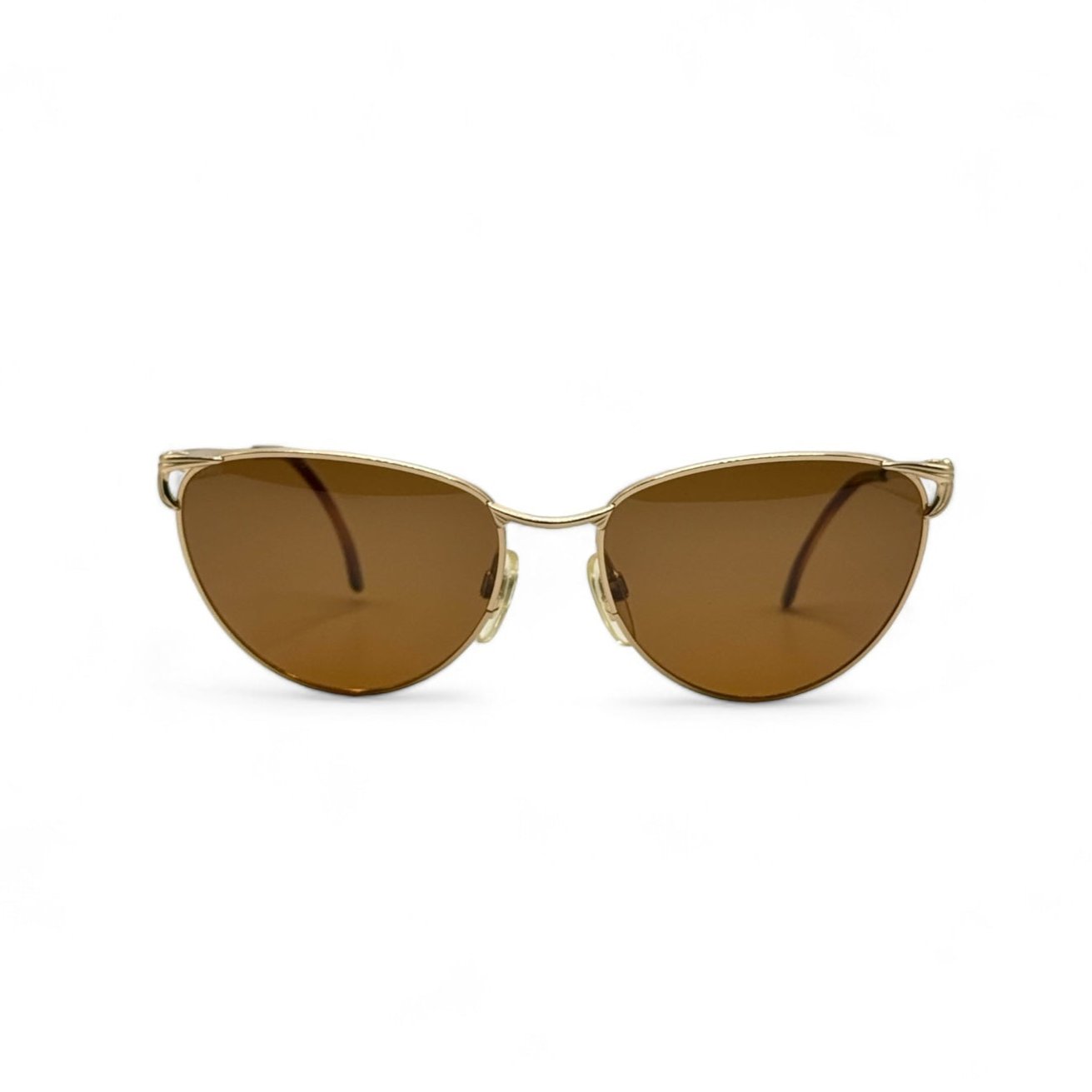 Front view of vintage Les Copains sunglasses, showcasing elegant frames made in Italy. These high-quality sunglasses feature new brown UV400 lenses for superior sun protection and timeless style.